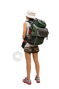 带背包和睡袋走路的妇女徒步旅行图片