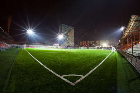 足球背景足球足球场夜间竞技场明亮的聚光灯足图片