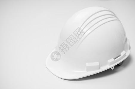 白色背景上隔离的安全白色头盔图片