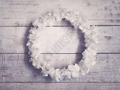 白花在木本底的怒气圆周花纹的婚礼装饰框架传图片