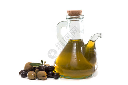 绿色和黑色橄榄含橄榄油瓶白图片