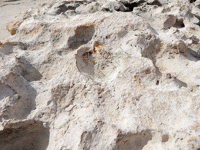 砂岩石头的纹理里海岸图片