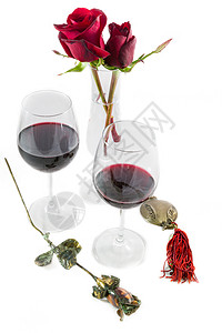 两颗玫瑰红葡萄酒眼镜金属玫瑰和石榴图片
