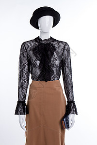 模特身上的帽子衬衫和裙子带蕾丝衬衫裙子和钱包的女模特黑帽子和ja图片