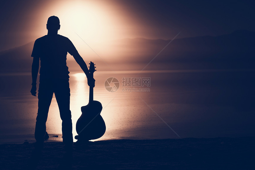 吉他太阳日落时声学吉他家的吉他师图片