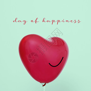 幸福的文字日和一个红色的心形气球图片