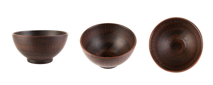 白色隔开的棕色陶瓷碗从侧图片