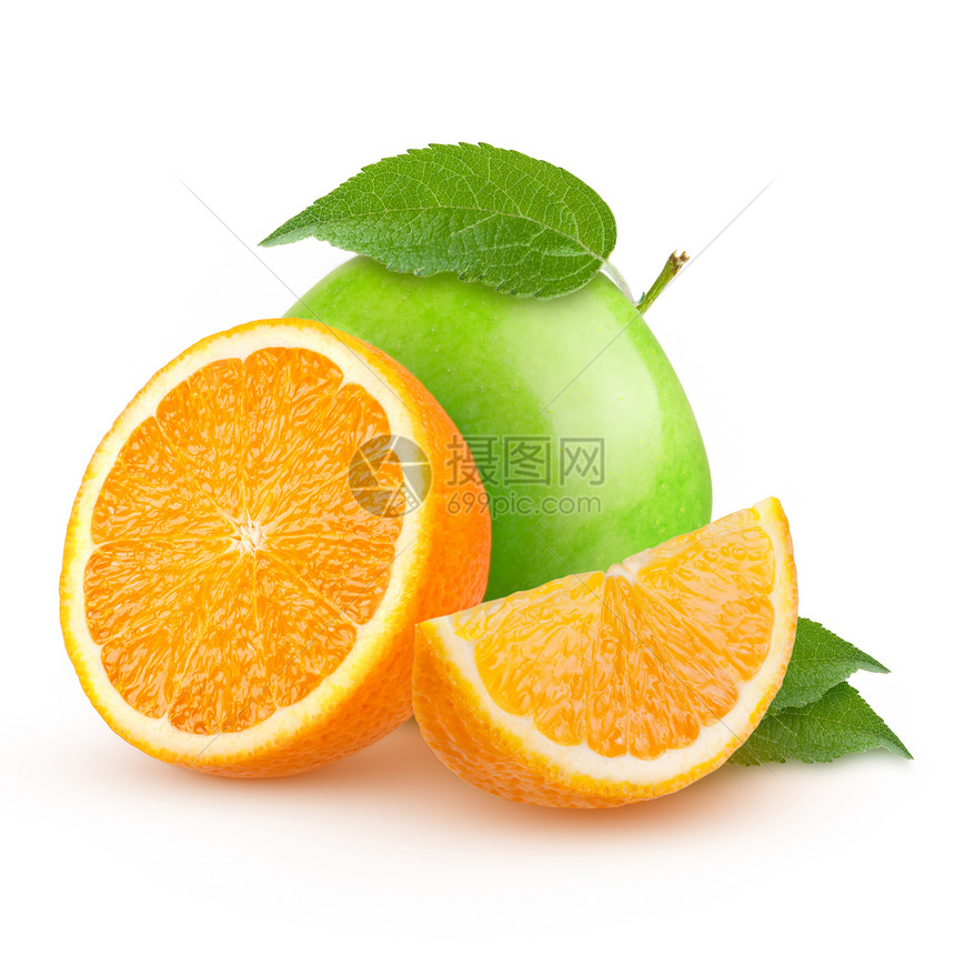 切开绿苹果和橙色水果图片