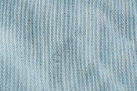 明亮的蓝色织物纹理背景柔软的白色桌布纹理图片