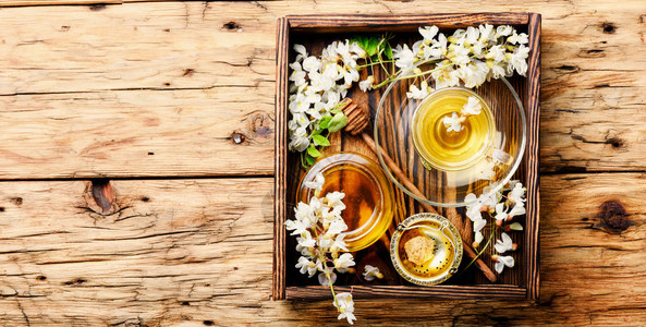 用金合欢花蜂蜜治疗凉茶凉茶背景图片