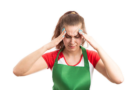 女仓库管理员或超市雇员用手按着痛苦的寺庙作为头痛问题图片