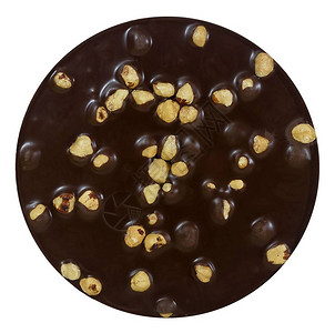 甜食甜圆巧克力与麦卡达米亚孤图片