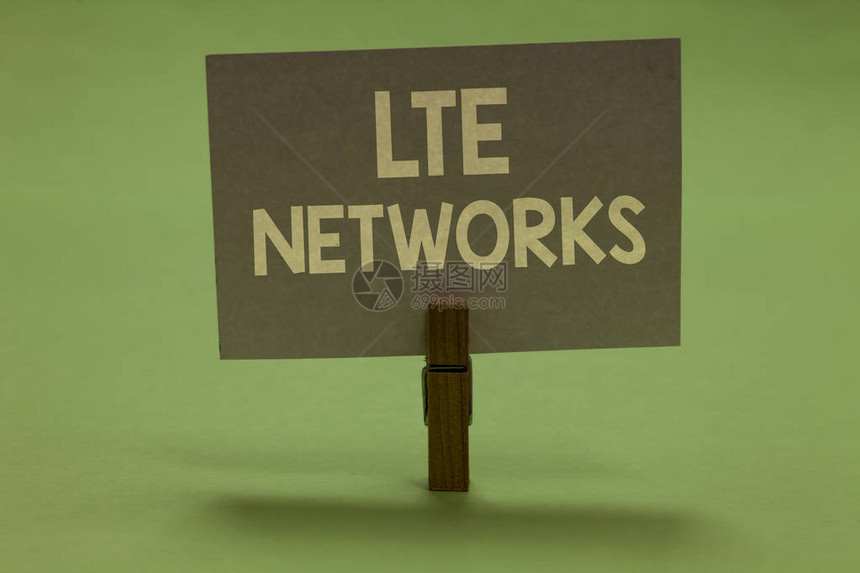 文字书写文本Lte网络可用于无线通信的最快网络连接的商业概念Clothespin持有灰色纸重要的图片