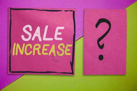 显示销售增加的书写笔记展示平均销售量增长的商业照片增加了潜图片