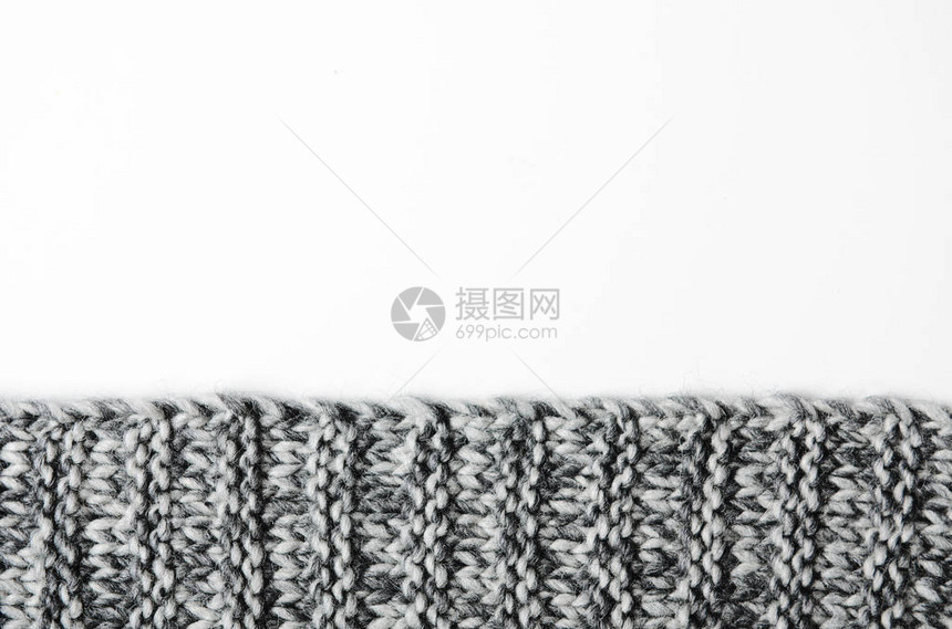 白色背景上的灰形编织格子边缘背景图片