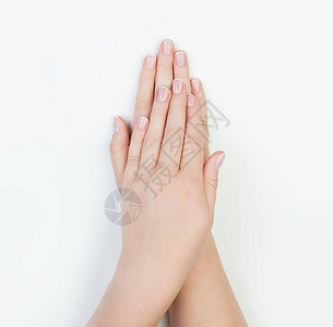 女用白色的手摸白背景Spa图片