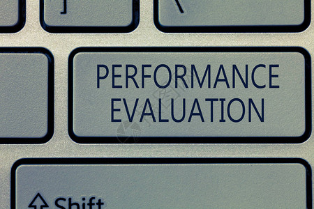 显示绩效评估的书写笔记展示评估员工绩效整体贡图片
