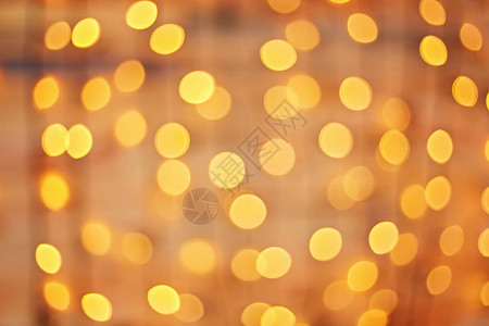 在庆典上闪亮黄金节庆灯的广场背图片