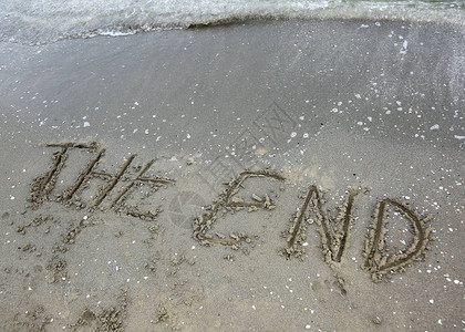写在沙滩上的词尾背景图片