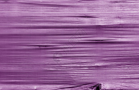 紫色的破碎透明塑料表面图片