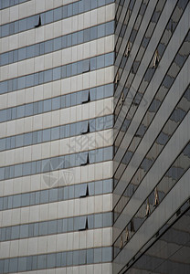 现代蓝色玻璃摩天大楼的建筑结构图图片