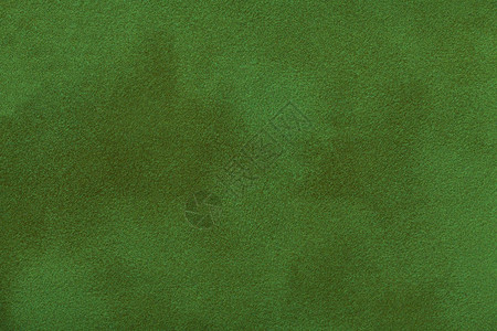 织物的深绿色垫底背景缝合无缝绿宝石皮革的天鹅绒纹图片