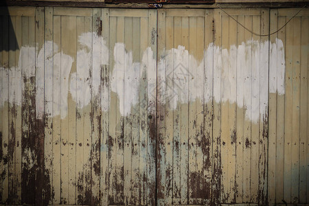 老古木摇摆门背景老木折叠门纹理葡萄酒旧木商业建筑的古董图片