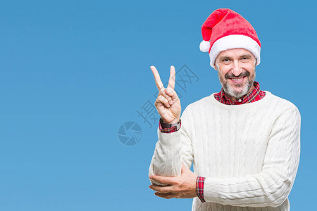 中年白发老人戴着圣诞帽图片