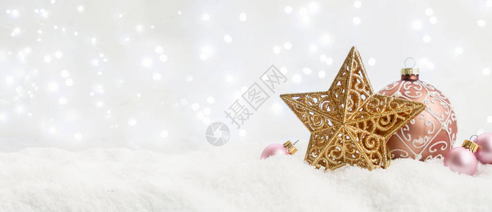 白色圣诞雪粉红色和金色装饰关闭横幅图片