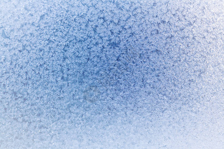 雪花和霜冻的冬季蓝色背景图片