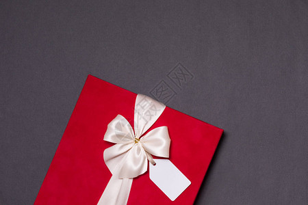 情人节浪漫的礼物彩带弓吉夫特标签现身无缝黑色背景背景图片