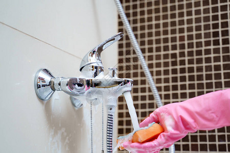 公寓粉红色橡胶手套洗浴室搅背景图片