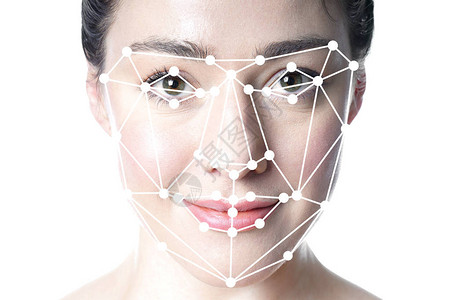 面部检测或面部识别网格覆盖在年轻美女脸上图片