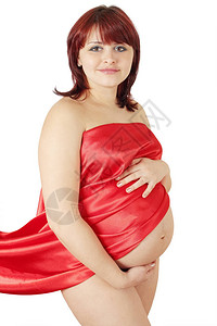 红布的美丽的孕妇图片