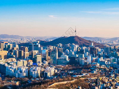 南韩首尔市有高塔的美丽建筑背景图片