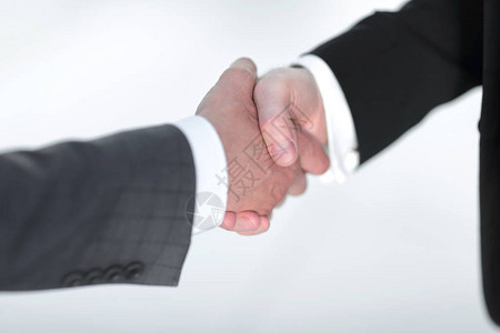 商业伙伴之间可信赖地握手合作的概念图片