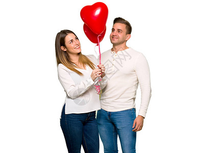 情人节情侣带着心形气球图片