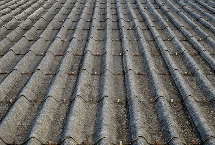 旧的灰色混凝土屋顶砖块背景图片