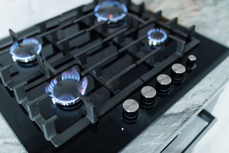 带燃烧气环的灶台燃气灶具蓝色火背景图片