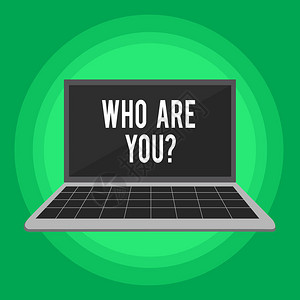 手写文字书写你是谁的问题概念照片询问某人的身份或演示信息带有网格设计键盘和柔背景上的空白黑屏背景图片