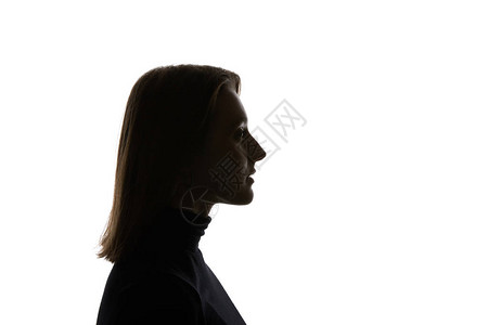 直发的女人的剪影被白色隔离背景图片