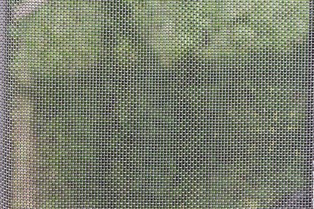 窗户上的蚊帐丝网纹理图片