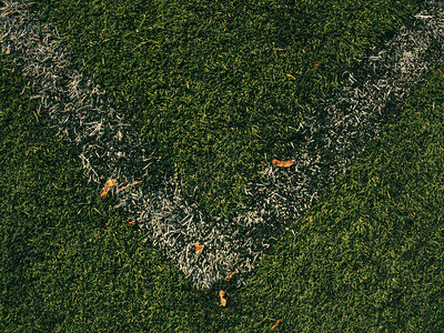 足球场或足球场角球线绿色足球场背景图片