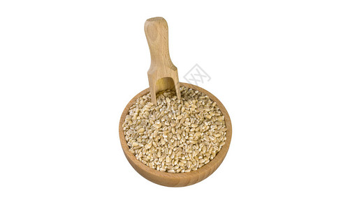 木碗里的珍珠大麦和白底的独家小便营养生物天然食物成图片