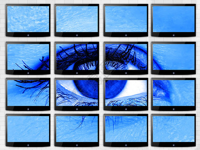 透过多屏幕平面电视科技概念的视频墙背景图片