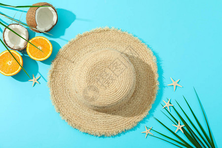 草帽橙子椰子棕榈叶和海星图片