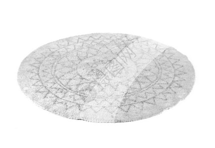 白色背景上的圆形地毯图片
