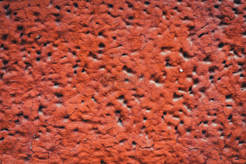 建筑物的一侧被漆成红色带孔特写的充气泡沫块的详细不完美纹理具有复制空间的宏中泡沫材料的构造图片