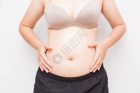 怀孕妇女肚子大肚子在白色背景上图片