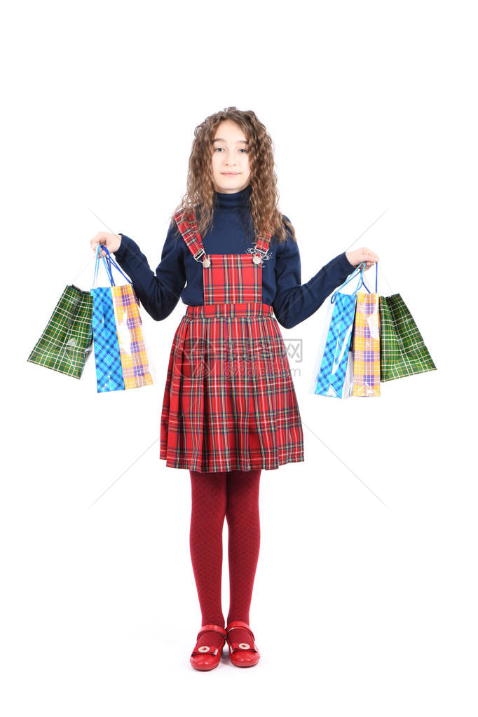 与包装格仔纹理孤立在白色背景上的孩子女孩喜欢在销售季节购物节日礼物图片